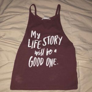 Tank crop top with writing on the front
